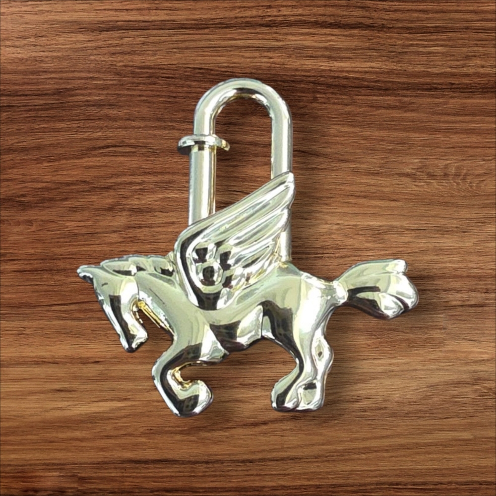 Cadena Gold tone Pegasus horse motif bag charm lock